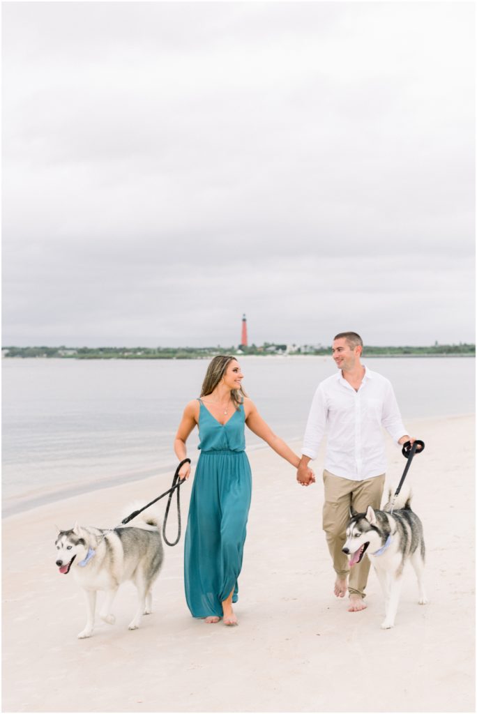 engagement session with dogs on beach