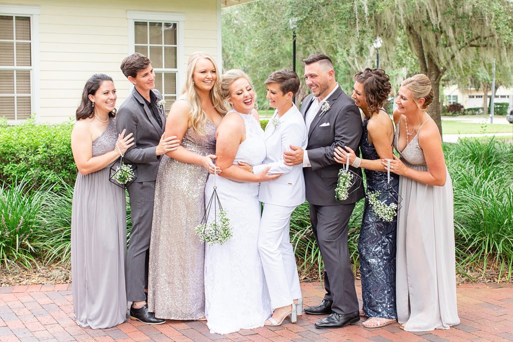 bridal party laughing with baby breaths