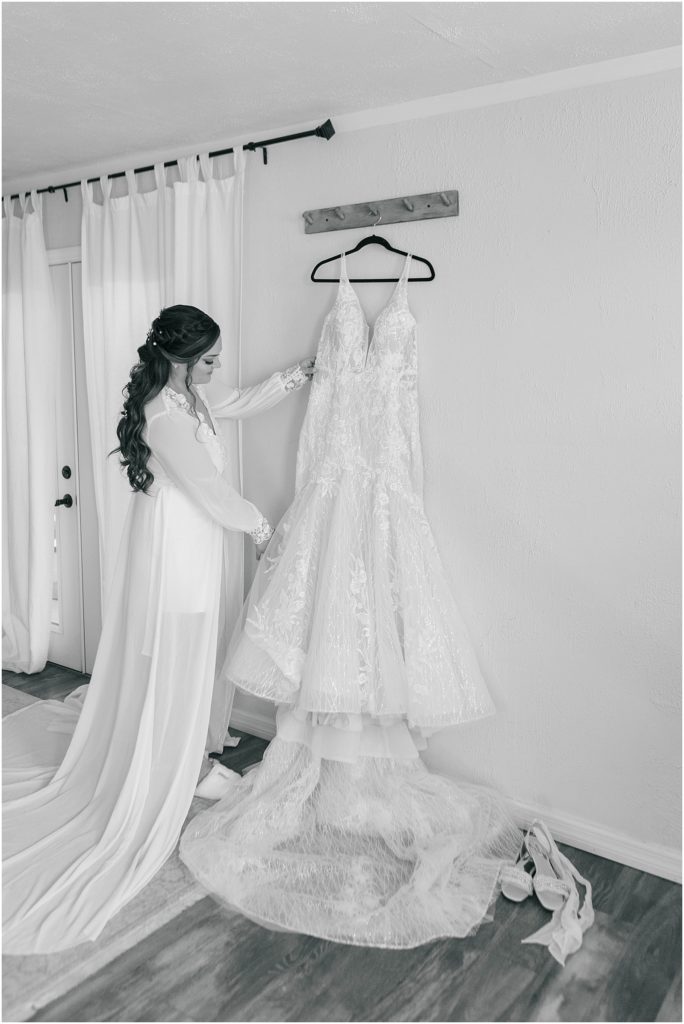 bride holding on her dress
